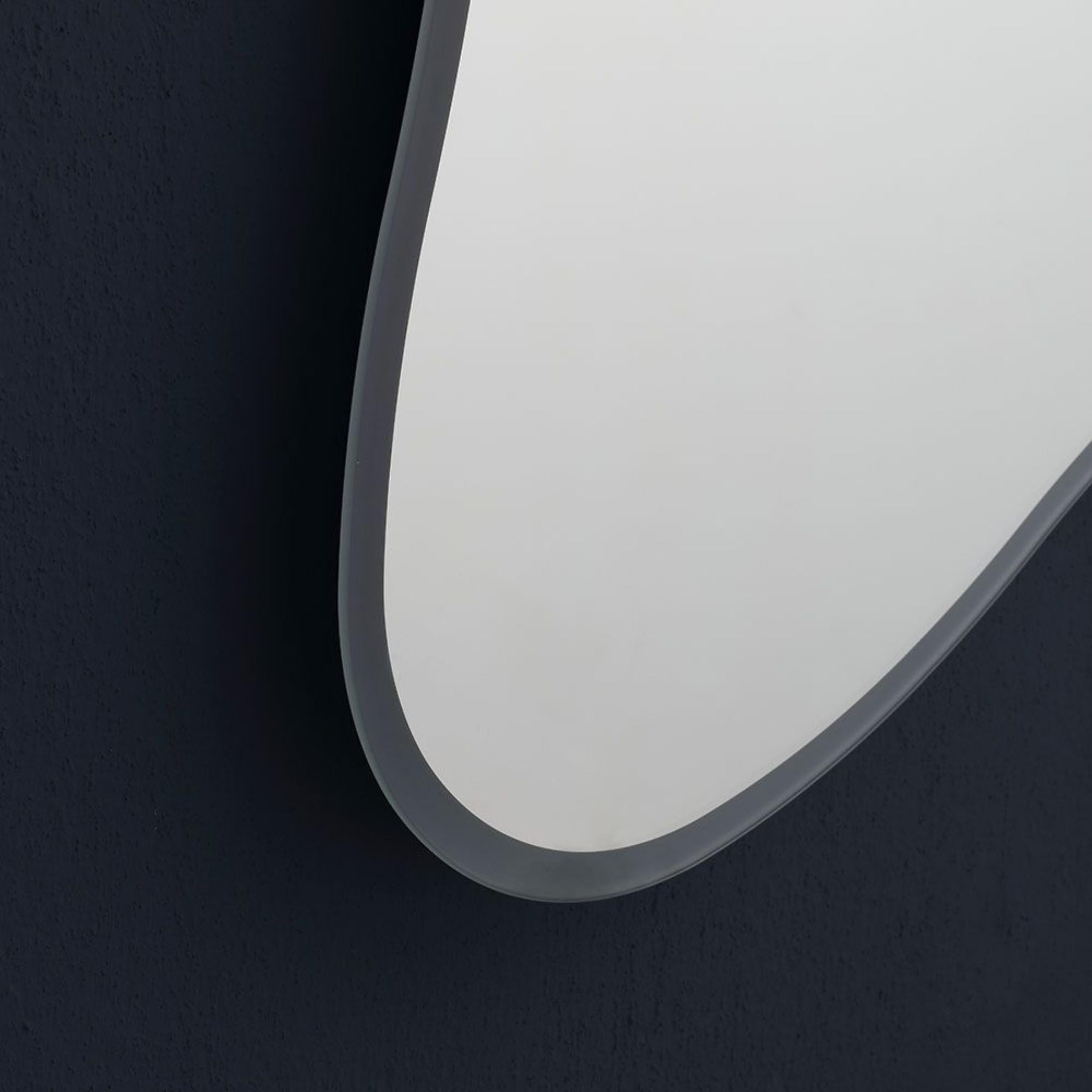 Reversible "Gresham" shaped LED mirror with backlit frame