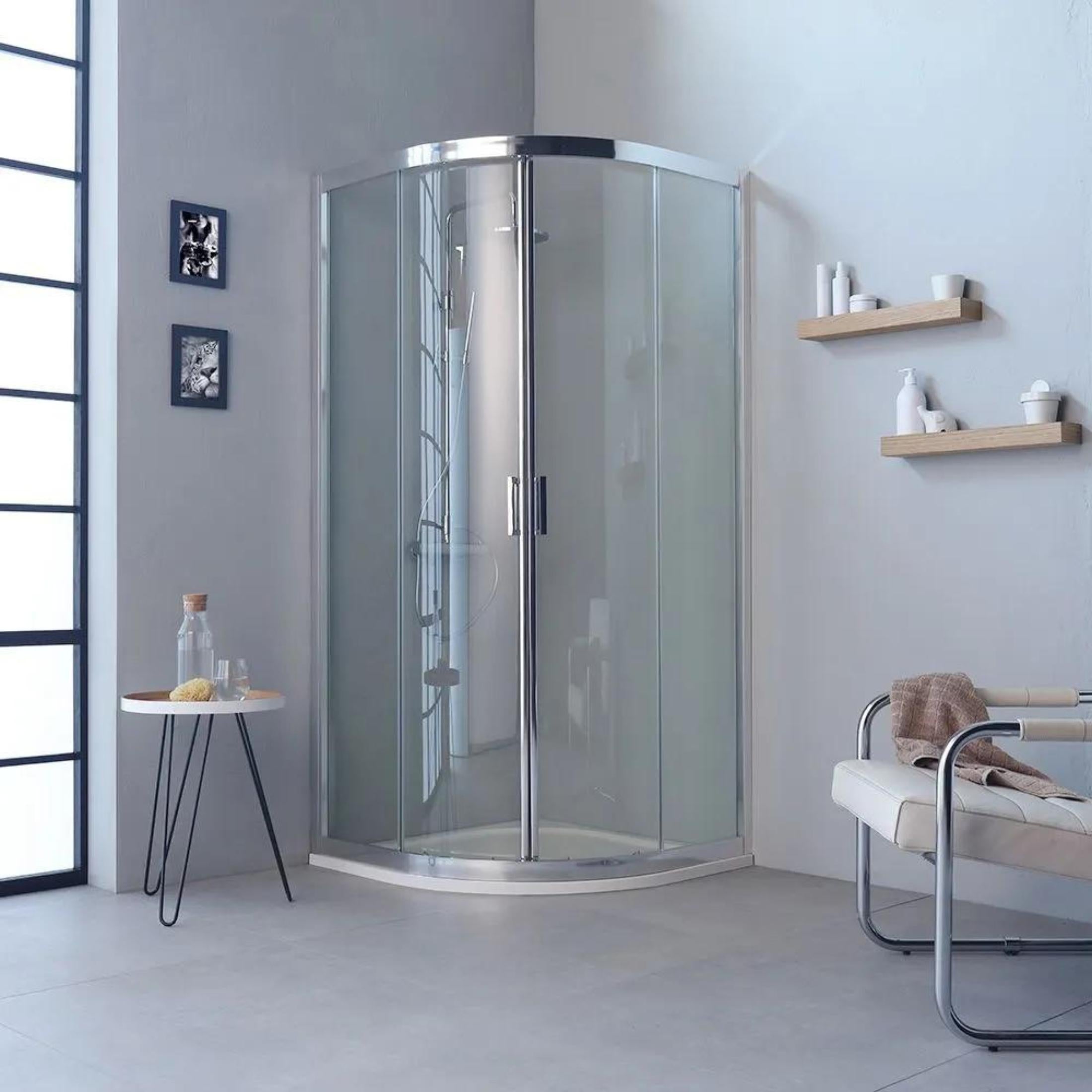 Semicircular shower enclosure with "Ferrara Two" sliding doors in tempered glass, 195 cm high.