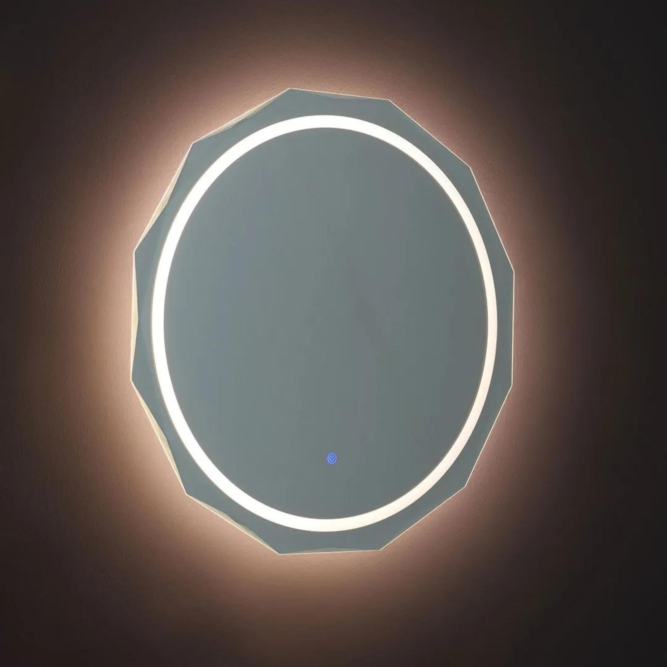 "Horizonte" LED mirror with faceted and illuminated edge