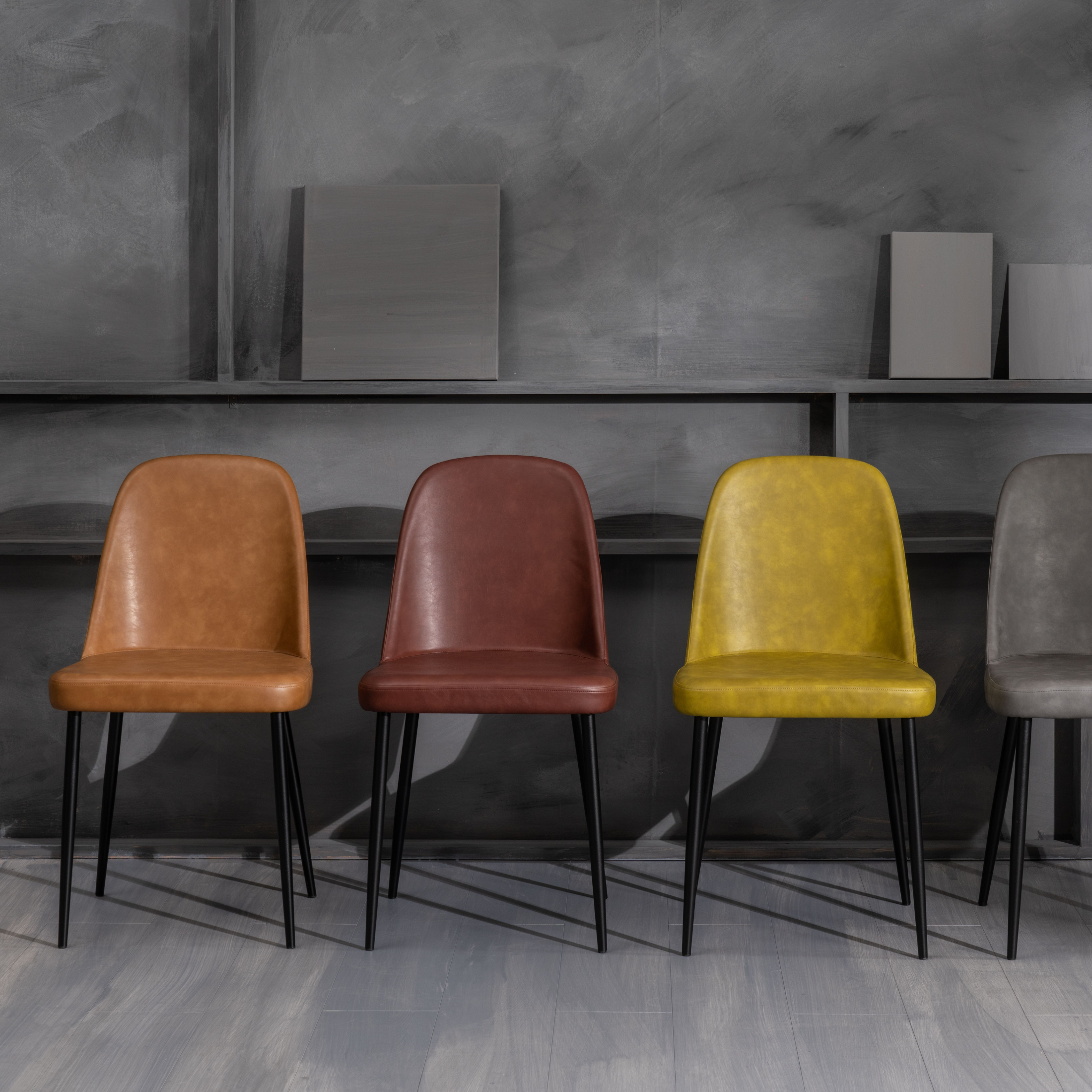 Set of modern "Damasco" dining chairs upholstered in soft-touch faux leather