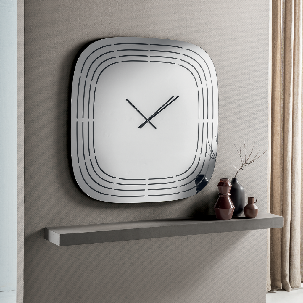 Mirrored glass wall clock with laser engravings, 120 x 120 cm.