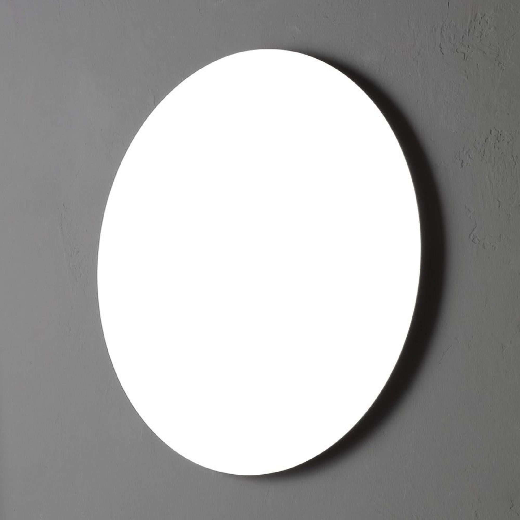 "Medford" modern round mirror with polished edge and reversible design