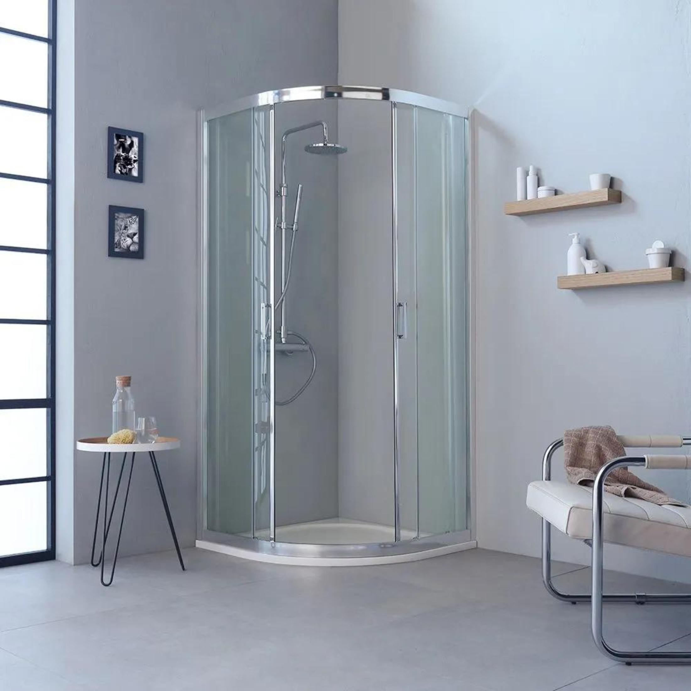 Semicircular shower enclosure with "Ferrara Two" sliding doors in tempered glass, 195 cm high.
