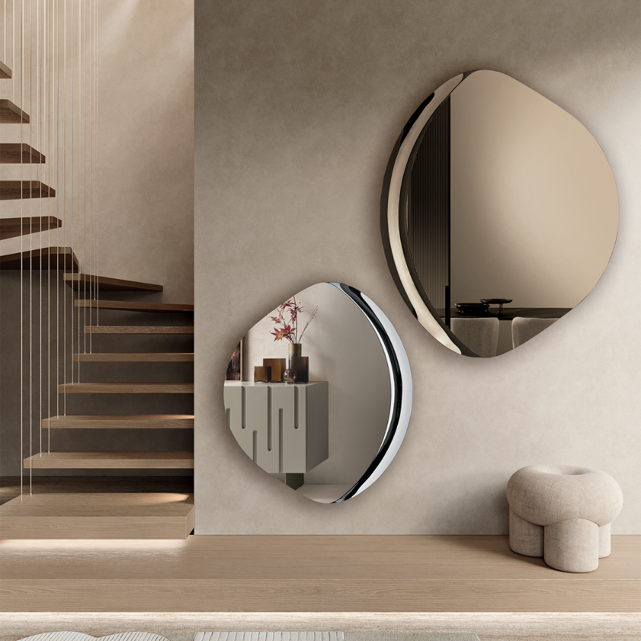 "Silhouette" shaped wall mirror with semi-frame in fused glass