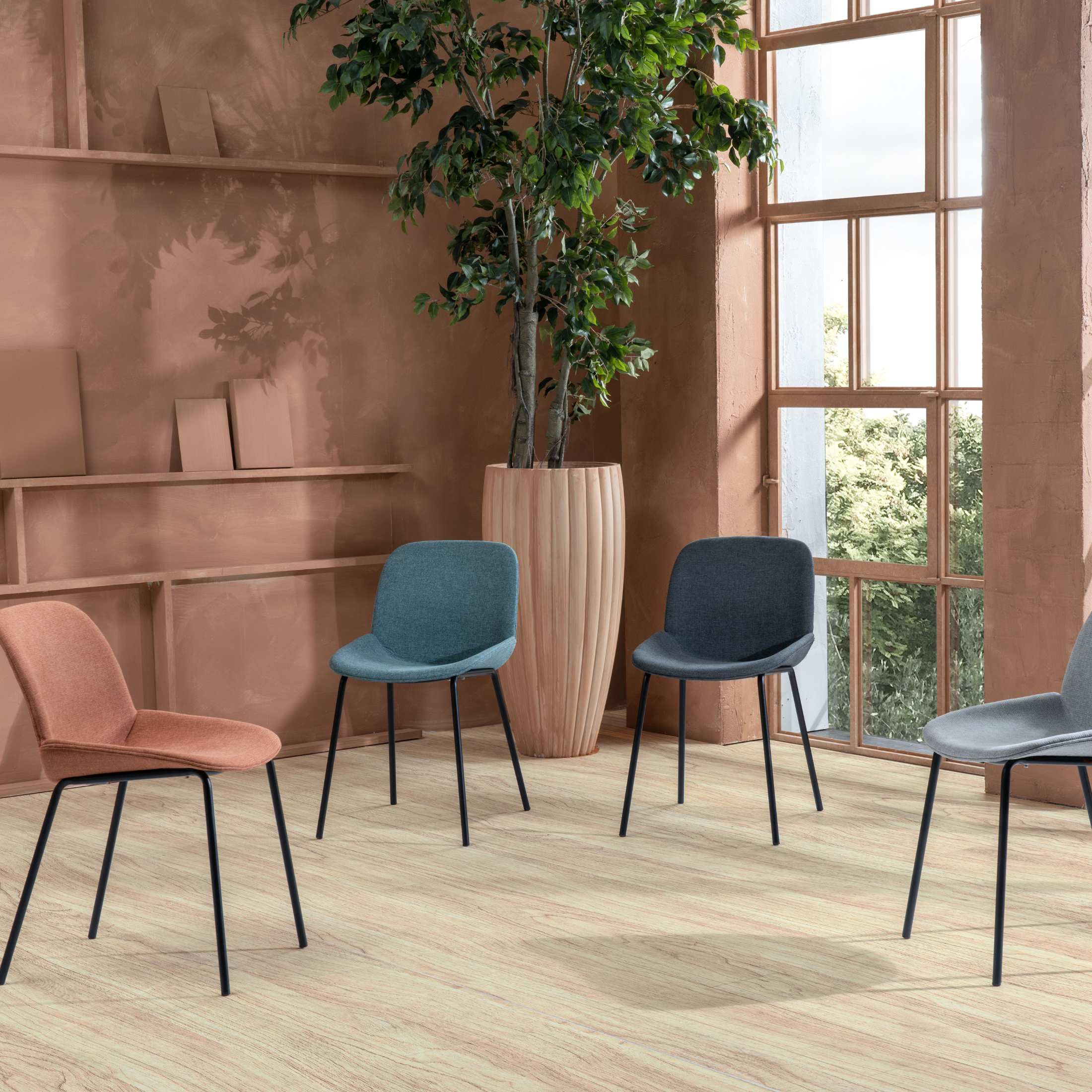 Set of "Sami" fabric dining chairs with elegant modern painted metal legs