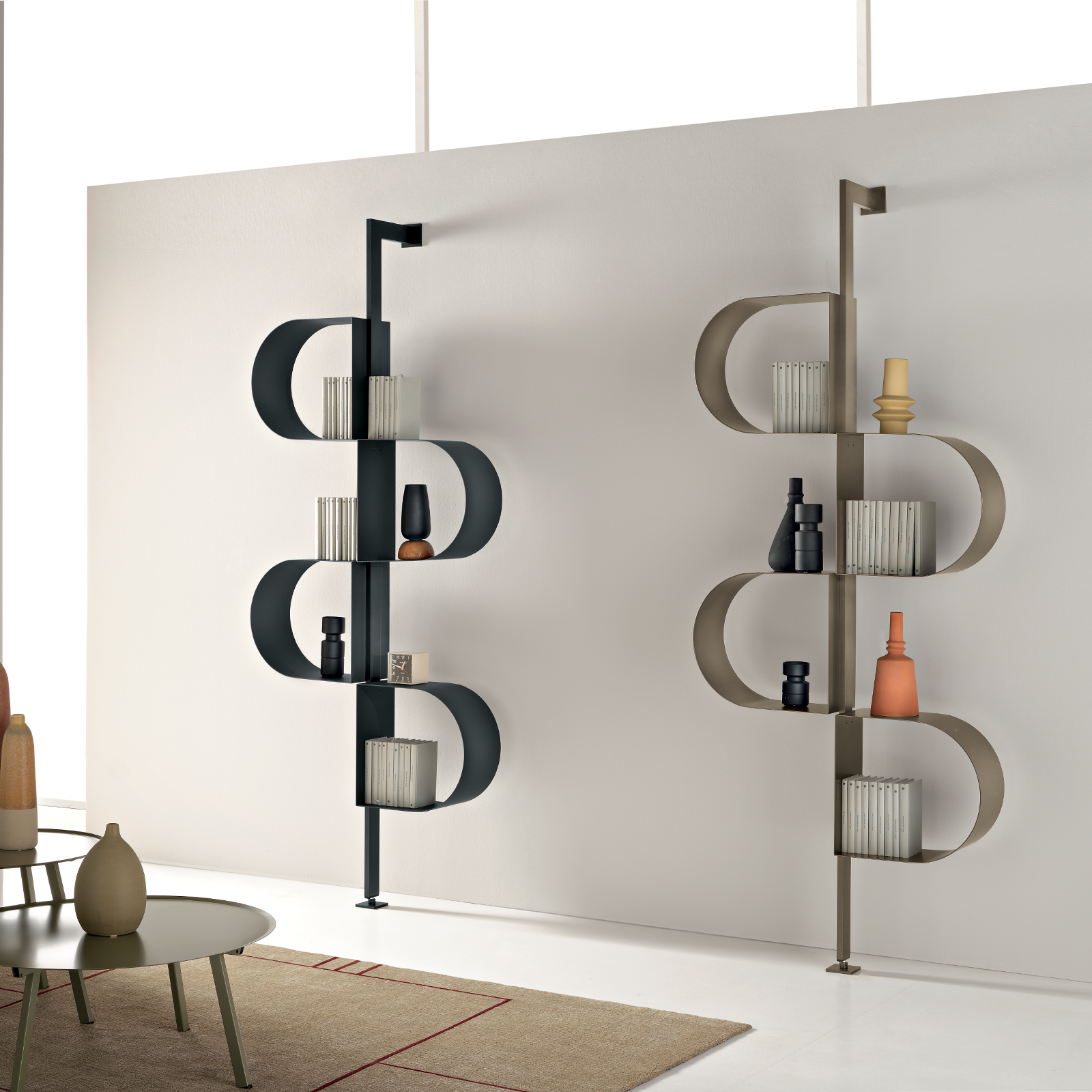 "Trama" vertical bookcase in painted metal with adjustable foot for wall mounting
