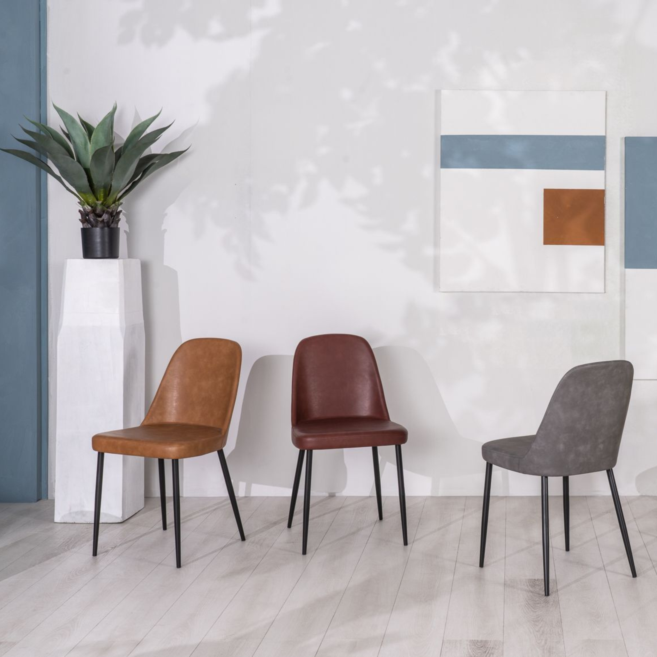 Set of modern "Damasco" dining chairs upholstered in soft-touch faux leather