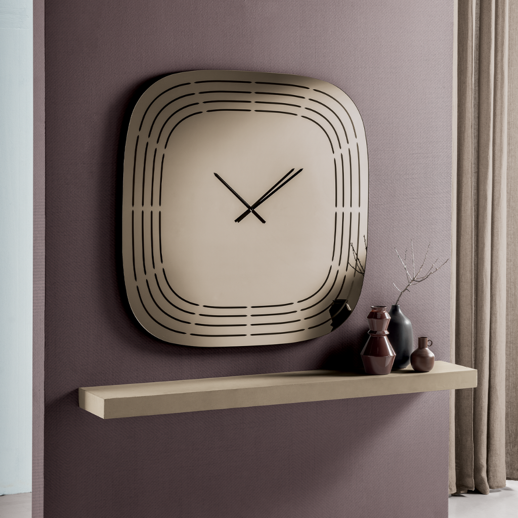 Mirrored glass wall clock with laser engravings, 120 x 120 cm.