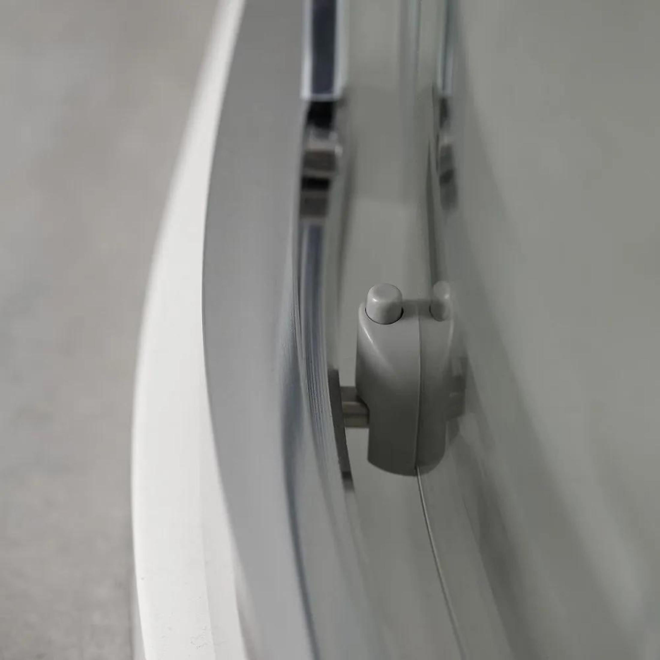 Semicircular shower enclosure with "Ferrara Two" sliding doors in tempered glass, 195 cm high.