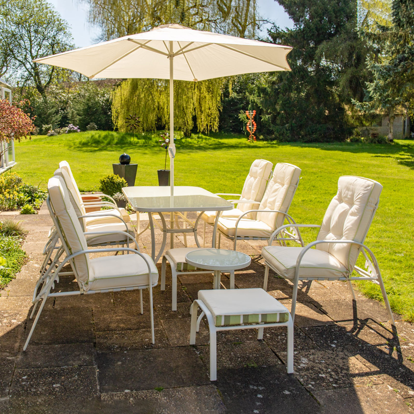 "Giove" metal dining table with tempered glass top and umbrella holder for the garden