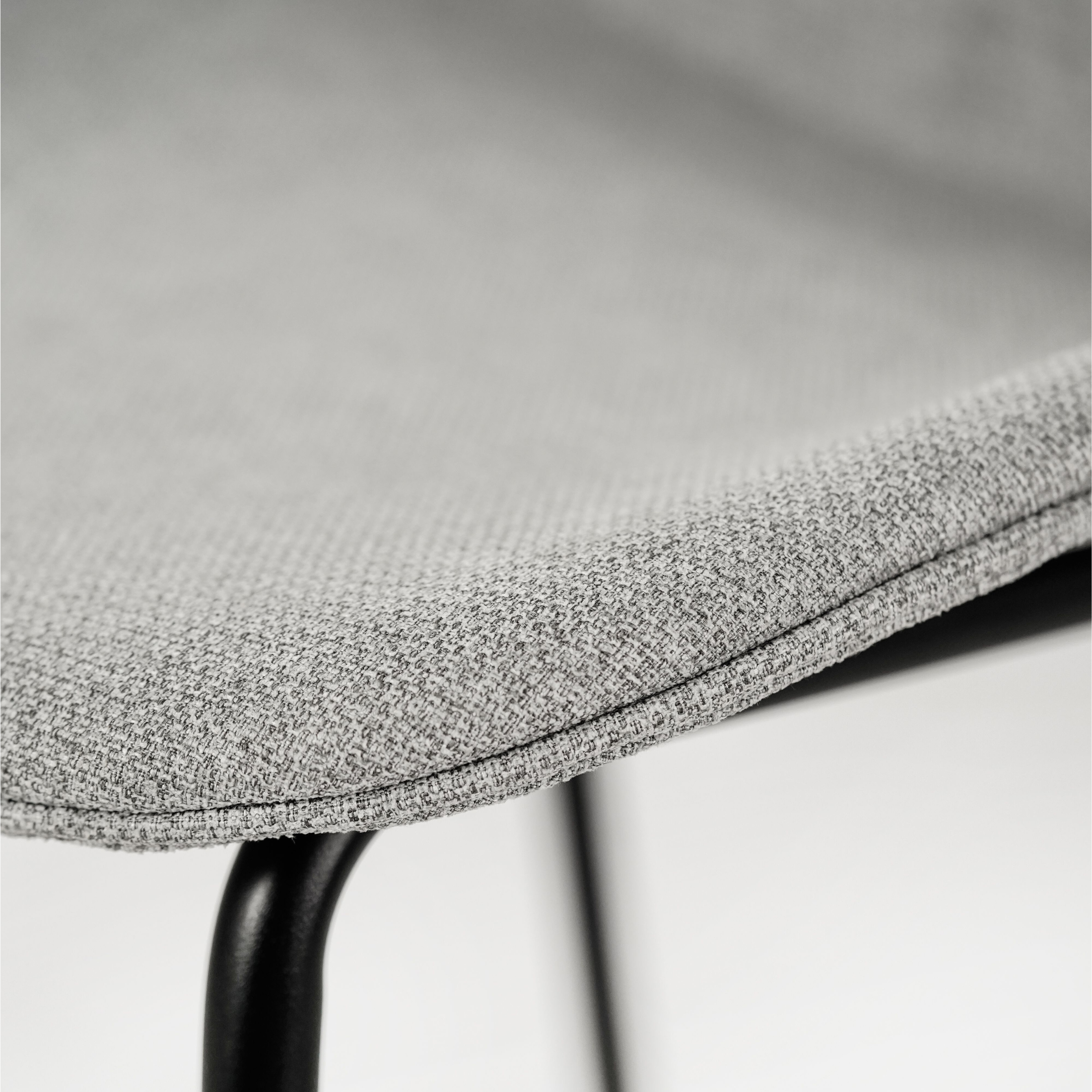 Set of "Sami" fabric dining chairs with elegant modern painted metal legs