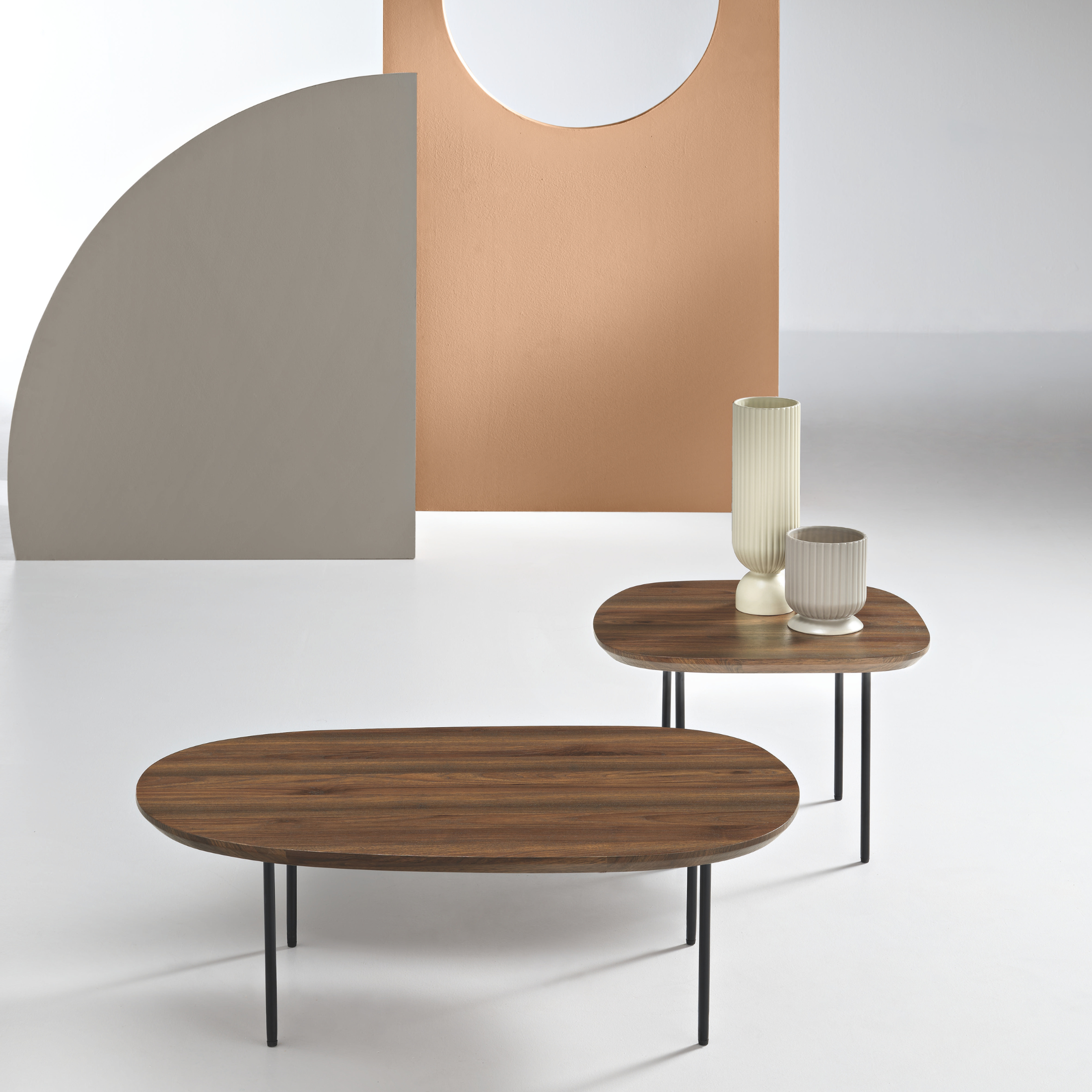 Modern "Flex" coffee table with shaped top and metal legs