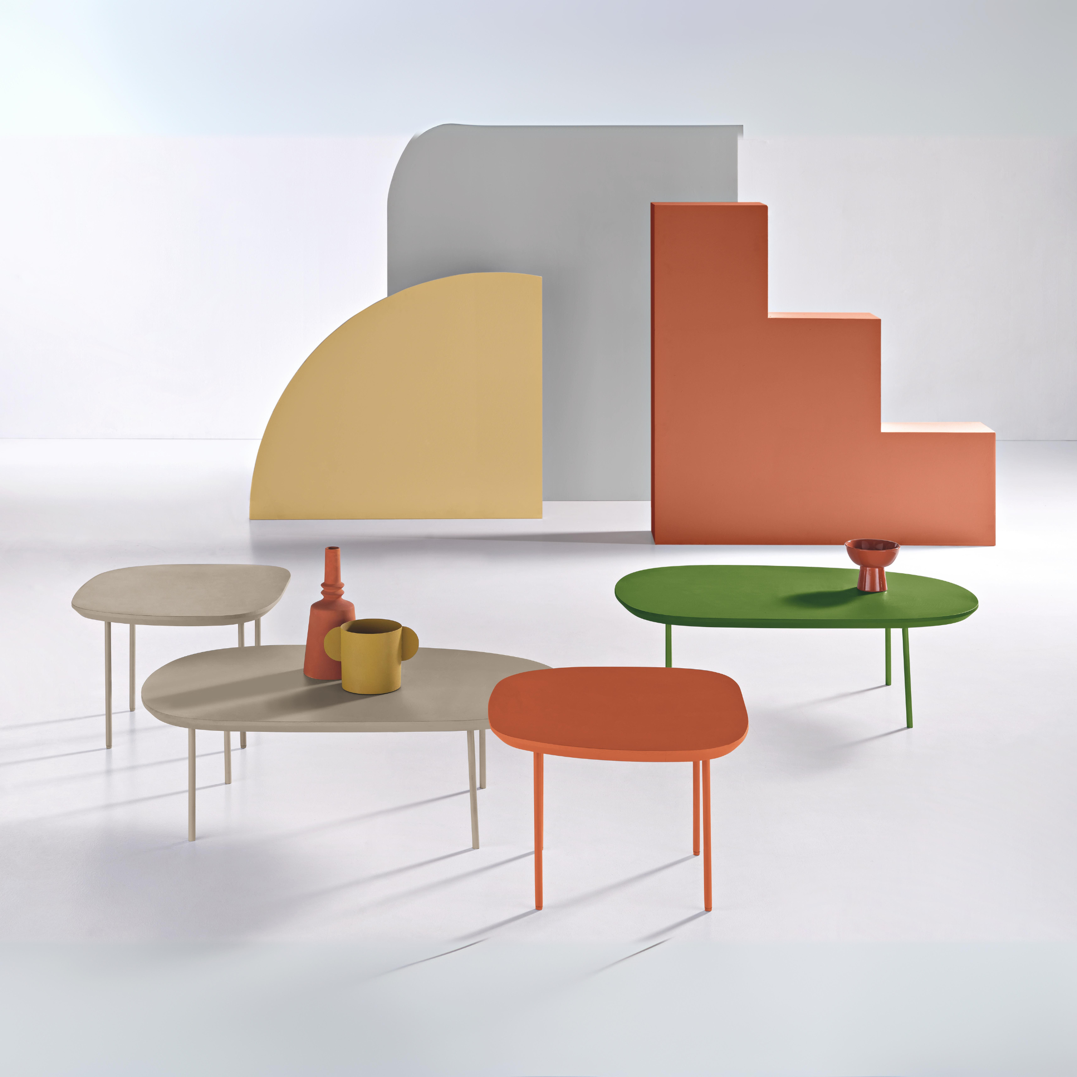 Modern "Flex" coffee table with shaped top and metal legs