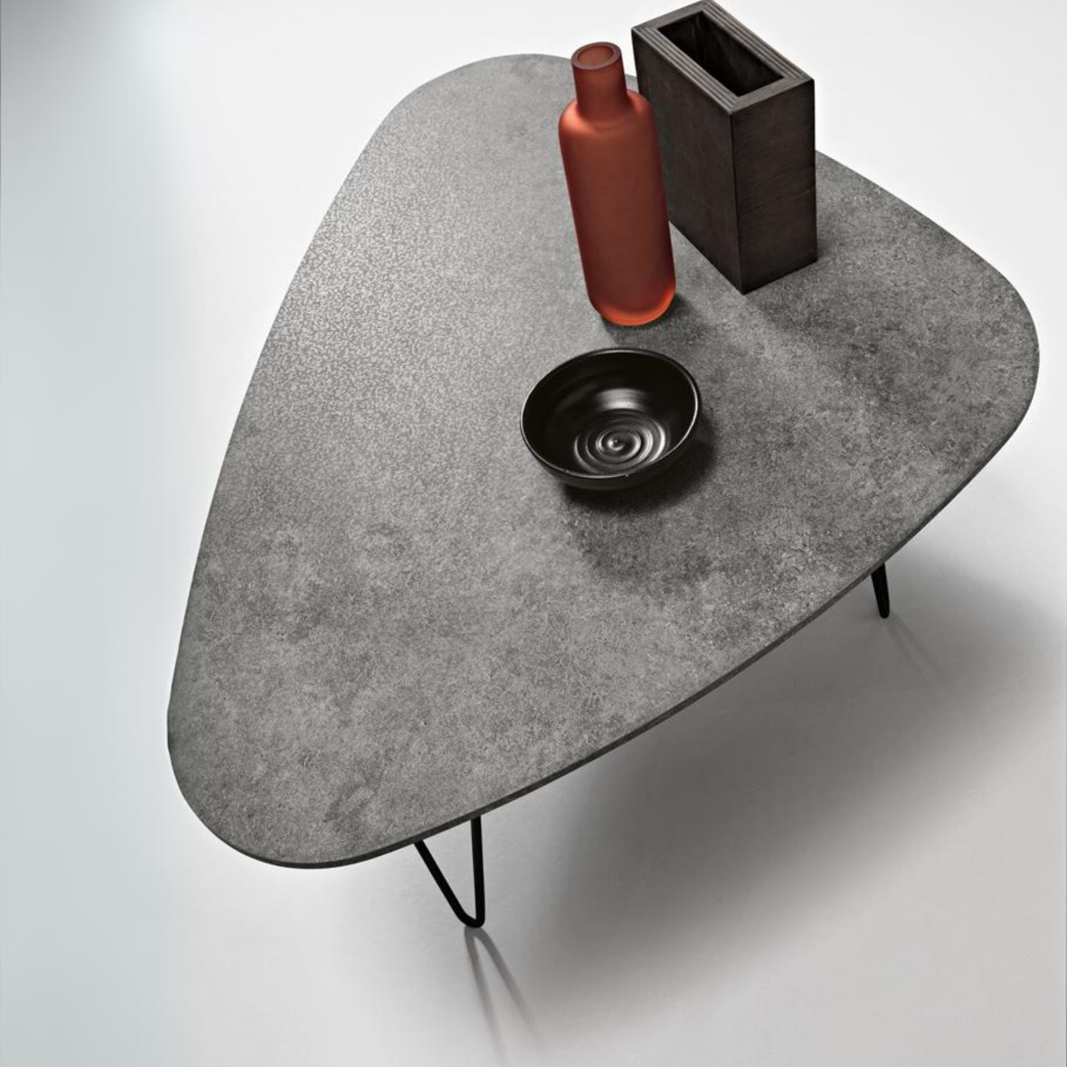 "Nicos" coffee table with shaped top and painted metal legs, 70x100 cm, 38h