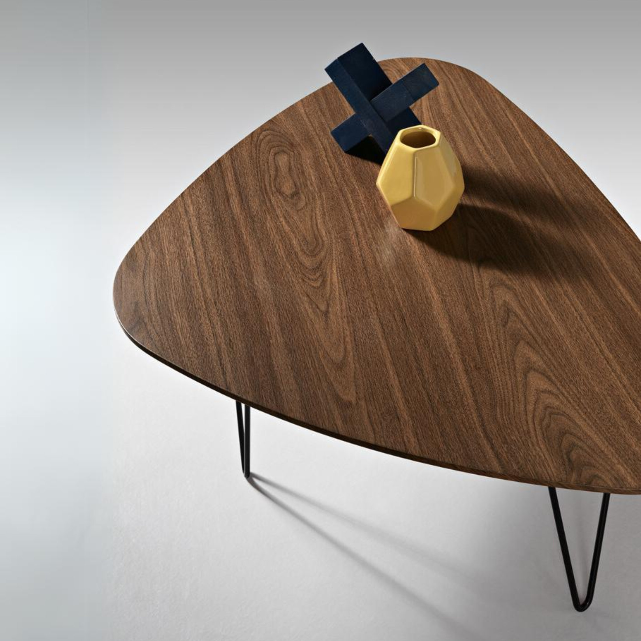 "Nicos" coffee table with shaped top and painted metal legs, 70x100 cm, 38h