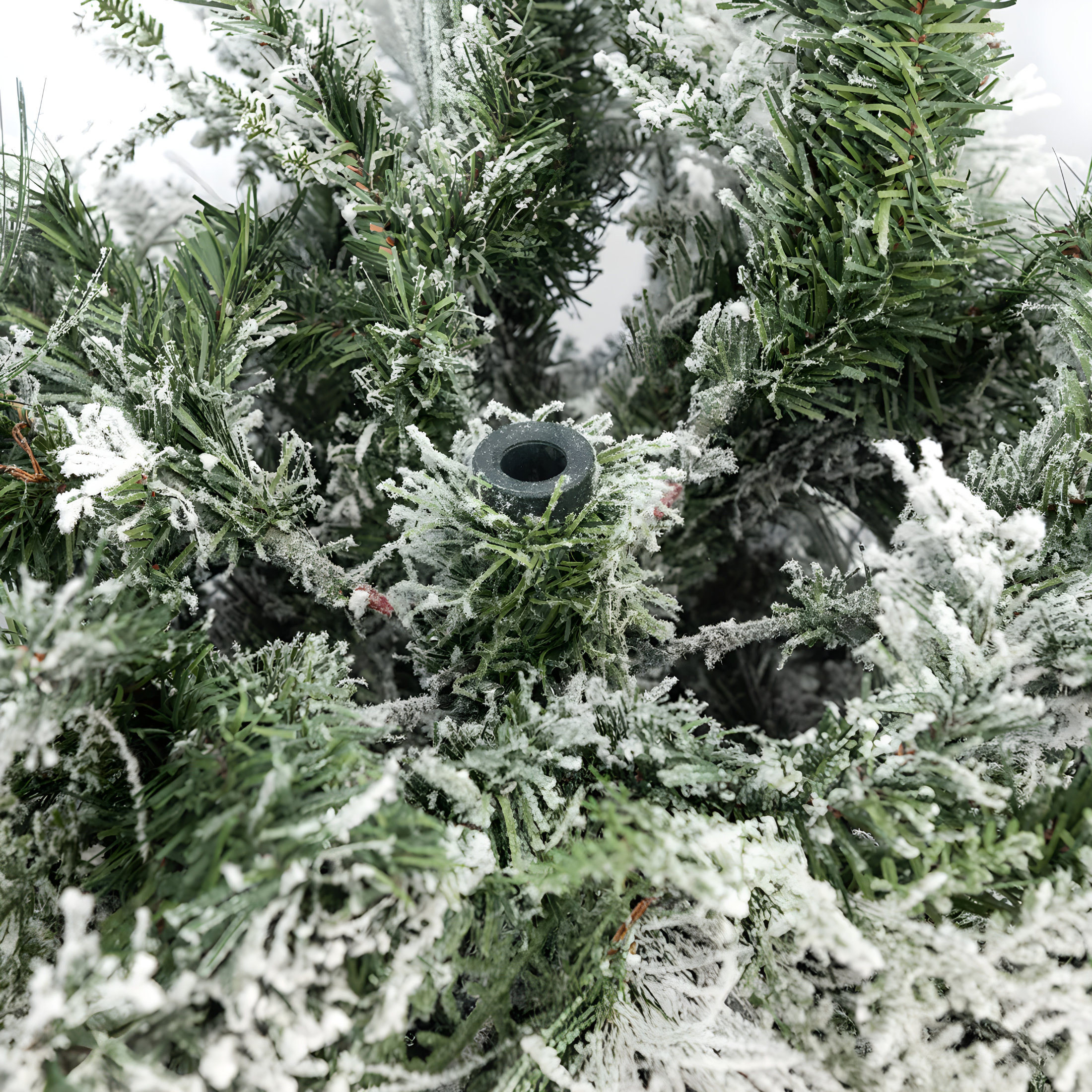 Árbol de Navidad nevado con piñas "Sleet" en PE efecto Real Touch + PP 240cm de alto