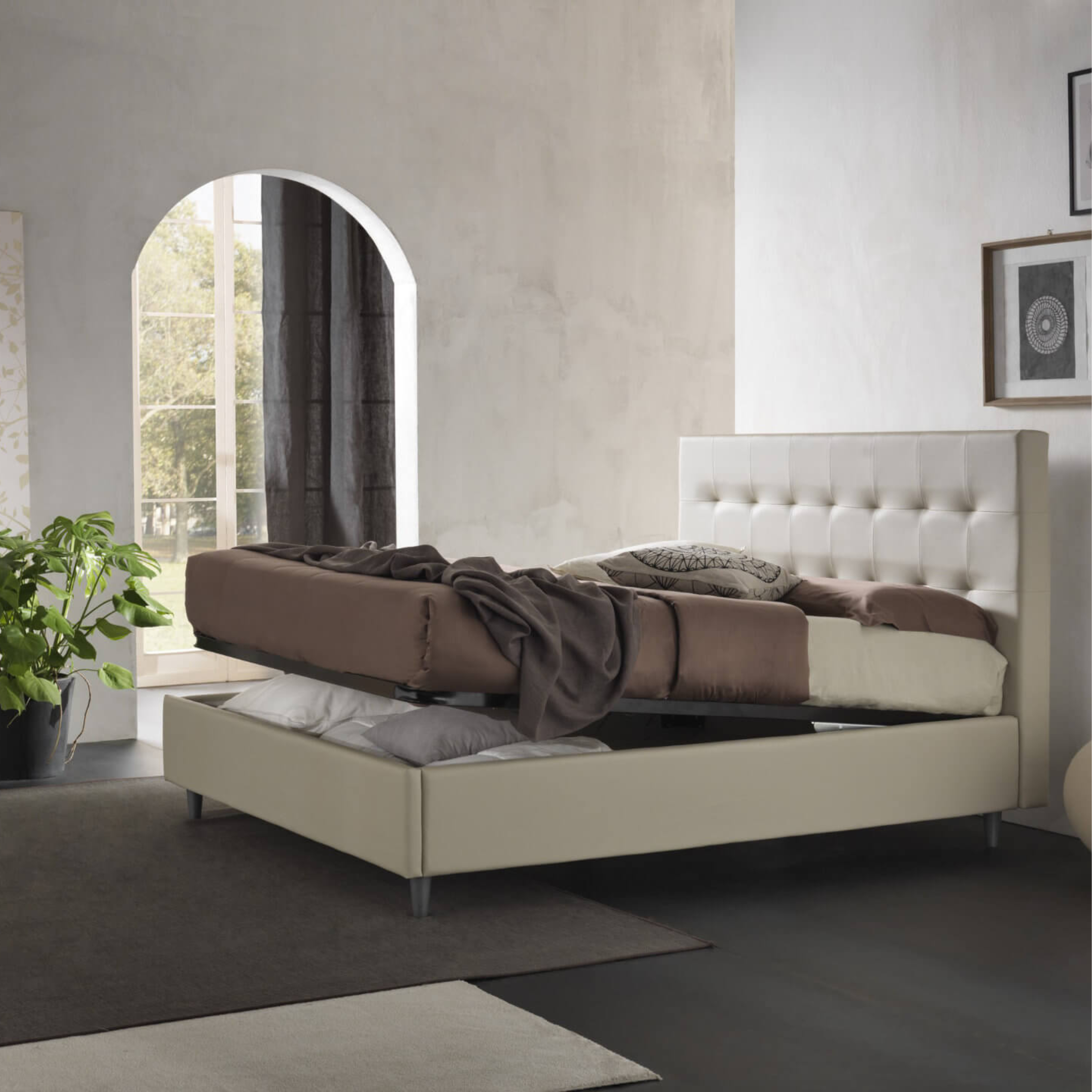 Modern "New York" padded storage bed with base in smooth velvet with conical foot