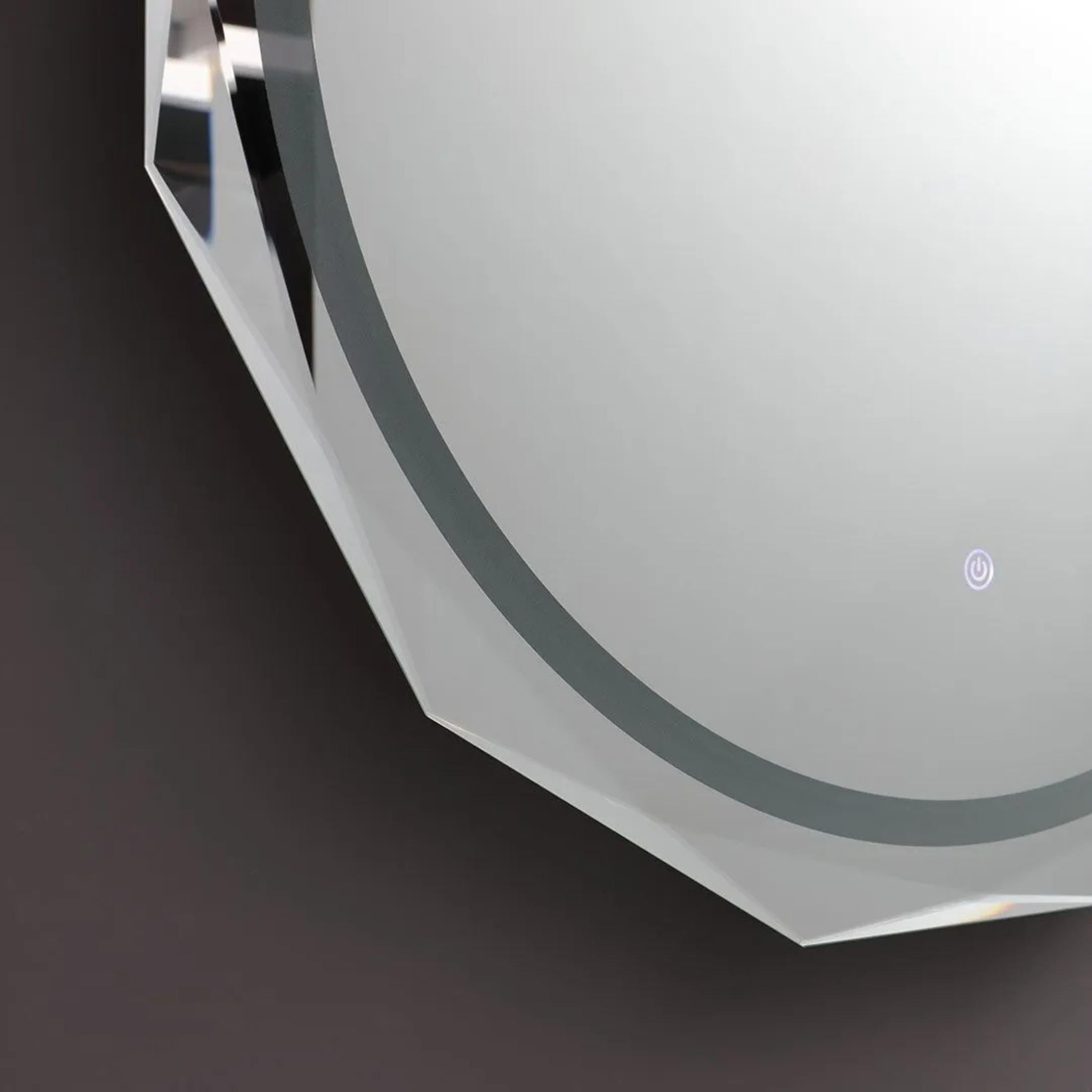 "Horizonte" LED mirror with faceted and illuminated edge