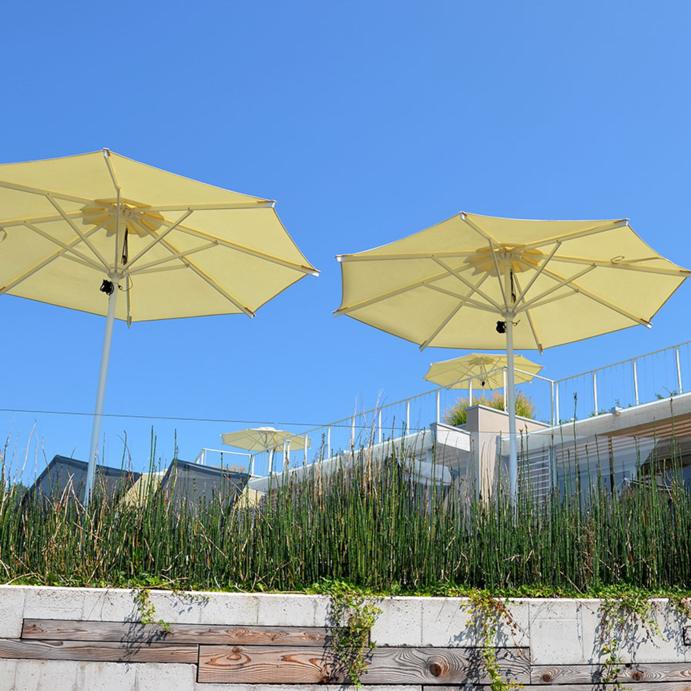 Modern "Zaffiro Classic" umbrella with white central pole