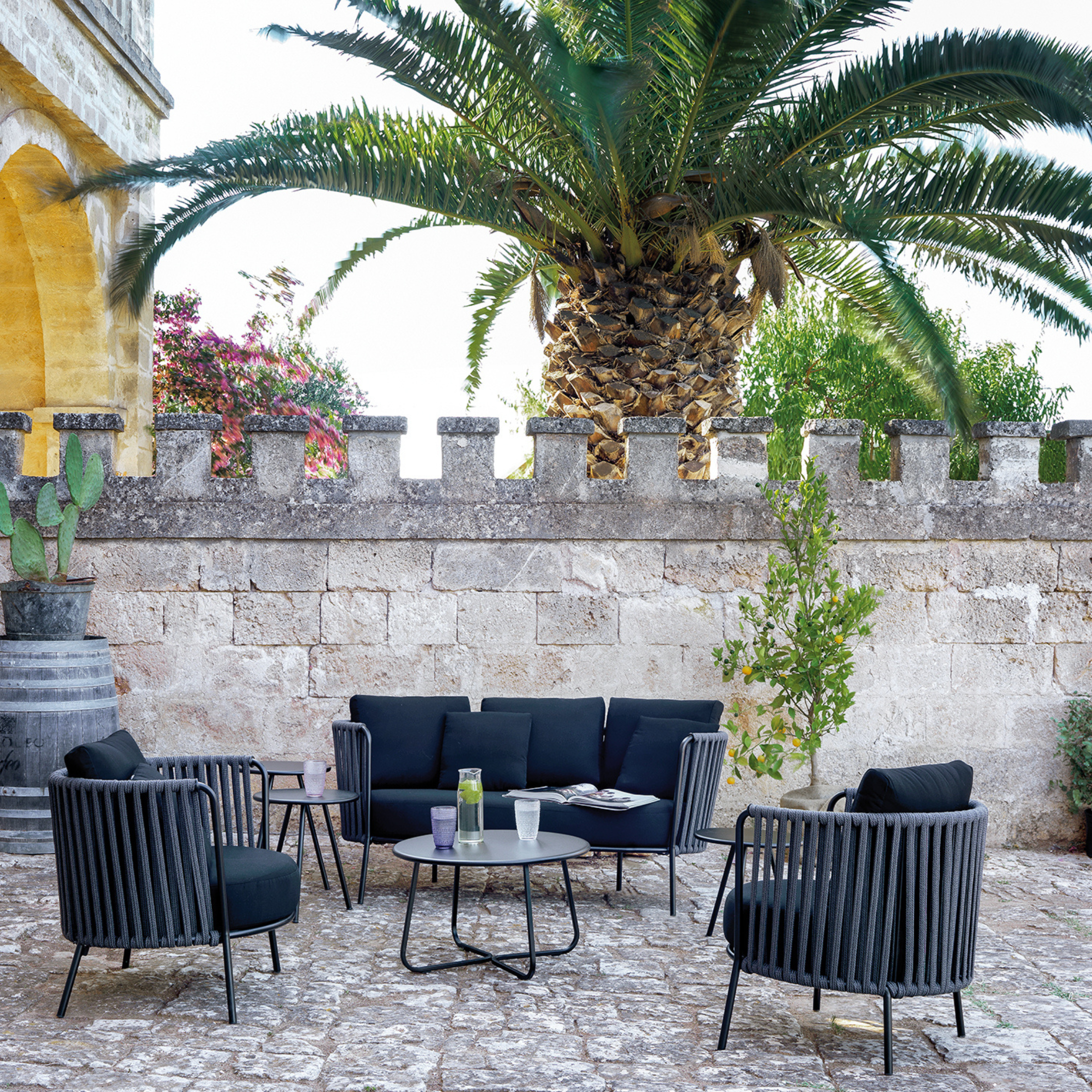 Low armchair in rope and stainless steel "Daisy Rope" garden lounge chair 74x74 cm 69h