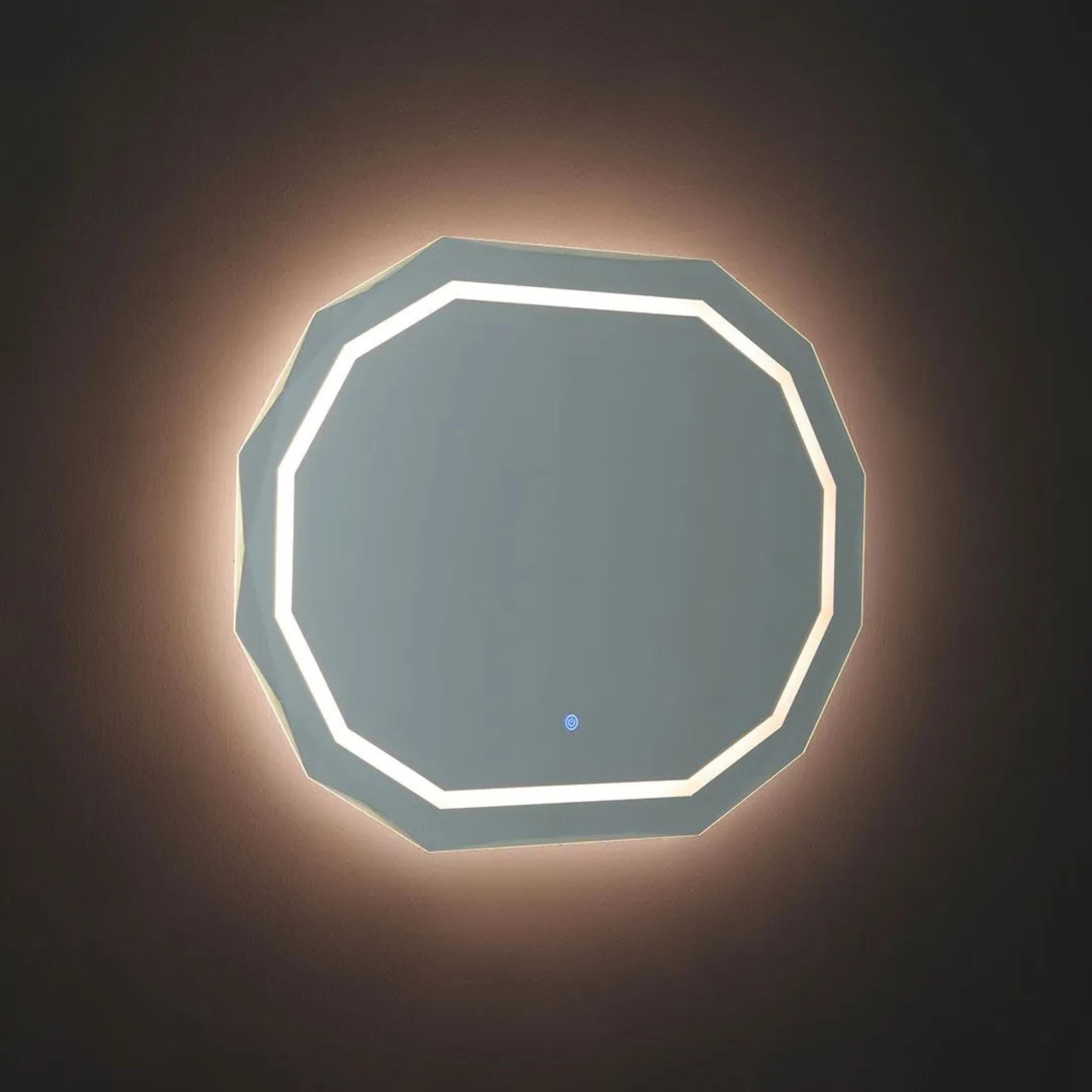 "Horizonte" LED mirror with faceted and illuminated edge