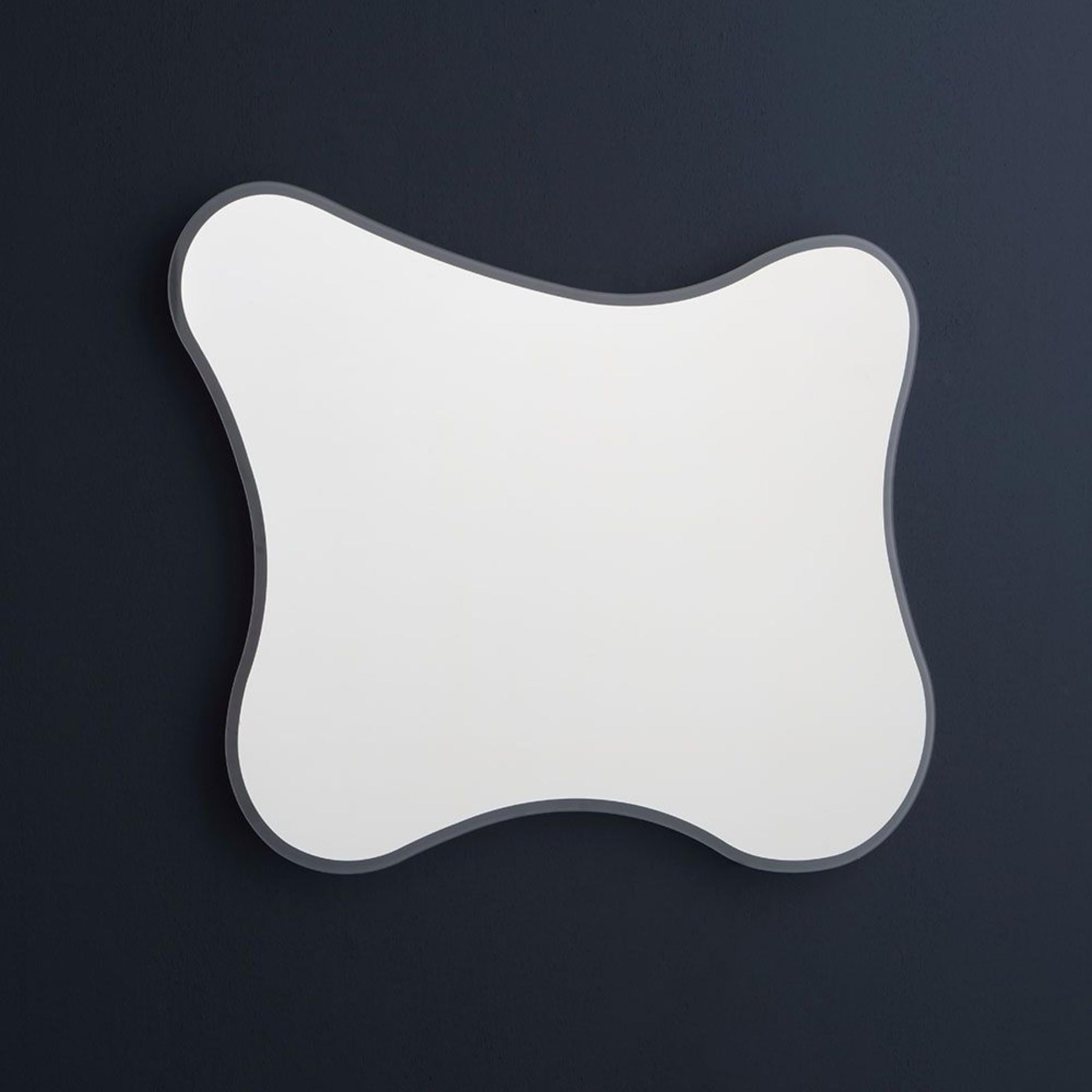 Reversible "Gresham" shaped LED mirror with backlit frame