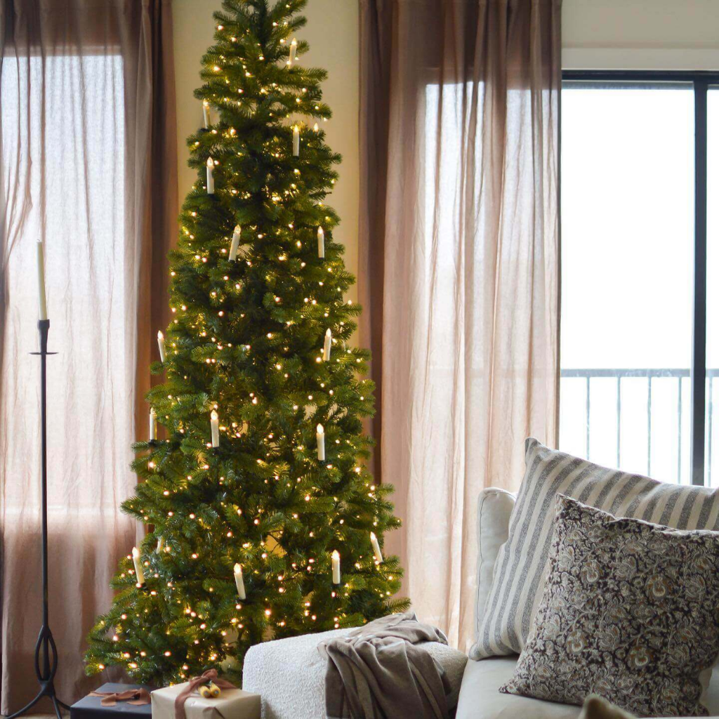 Slim "Gioia" Christmas tree with LED lights made of high-quality PVC.