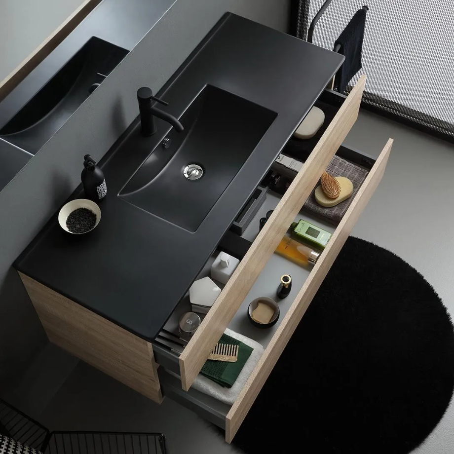 "Berlino60" oak-colored wall-hung bathroom cabinet with 2 drawers, black sink, and mirror