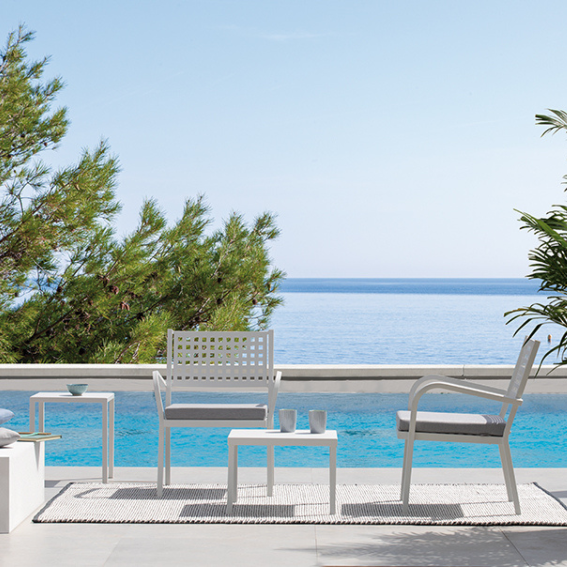 Set of modern "Alice" low stackable metal garden armchairs, 65x63 cm, 77 cm high.