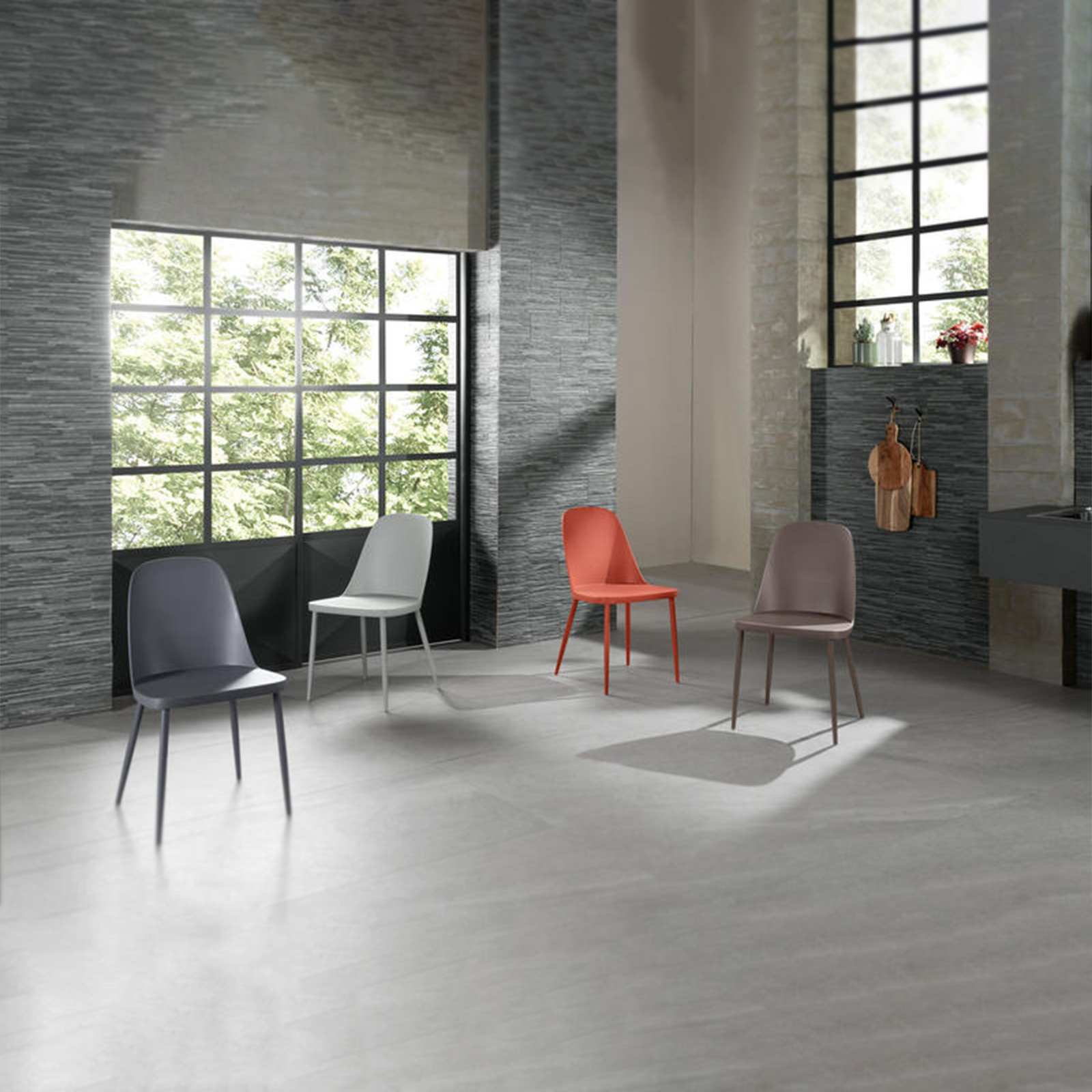 Set of modern "Paola" polypropylene chairs with painted metal legs