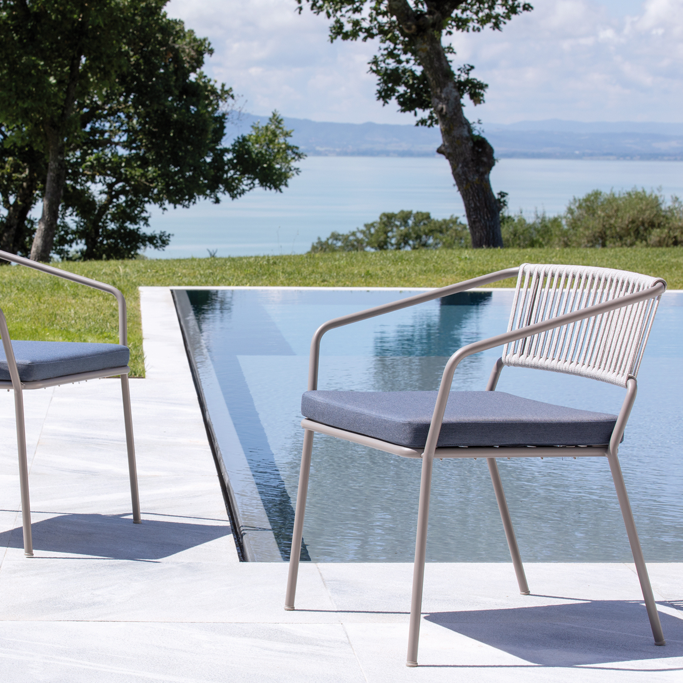 Low metal garden armchair "Slot" stackable lounge 68x65 cm 76h