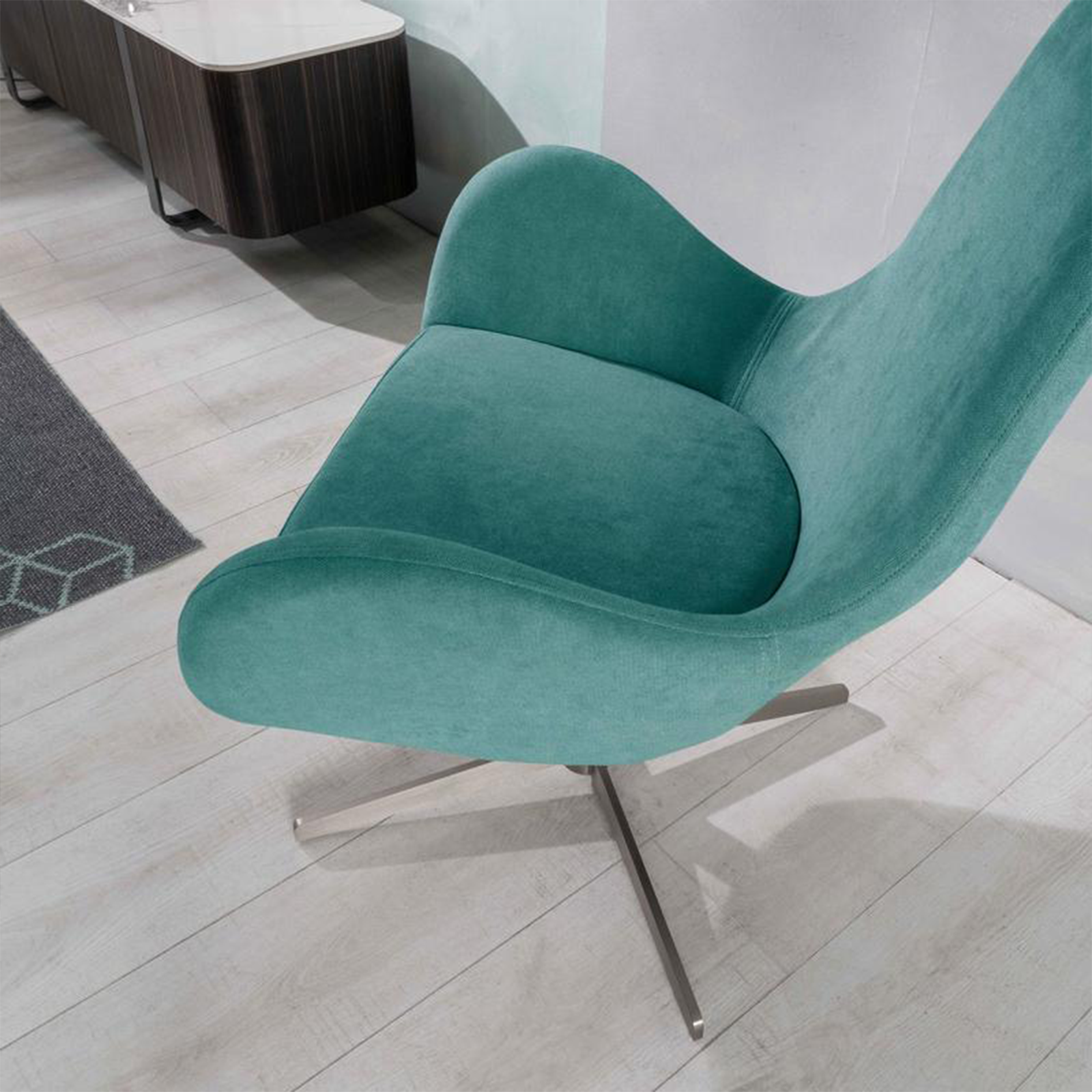 Modern swivel armchair "Orpea" in fabric with chrome base cm 72x64 85h