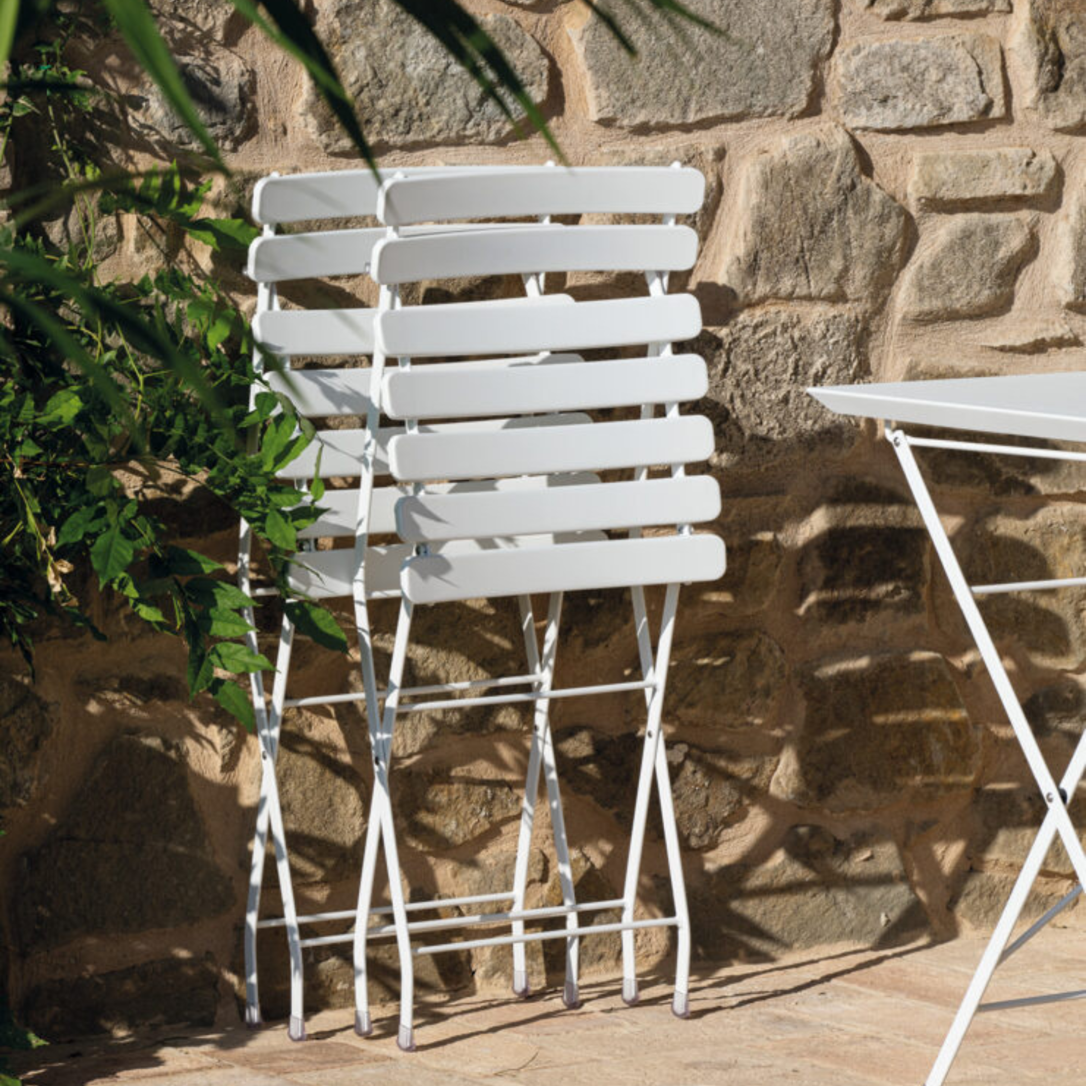 Set of modern folding "Step" chairs in painted metal for the garden