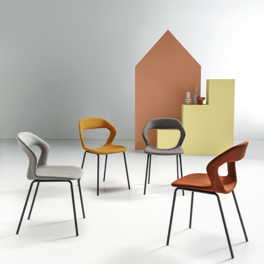 Set of "Gildus" upholstered chairs in fabric with enveloping backrest and central opening cm 54x51 87h